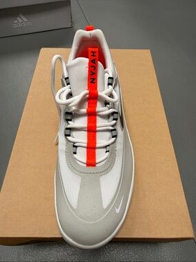 Nike Nyjah Men’s White, Gray & Orange Skate Sneaker